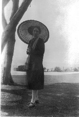 Elizabeth Madox Roberts with parasol